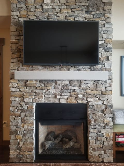 Gas fireplace and 50" Smart TV.