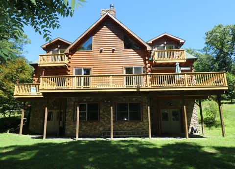 Back of house; Long deck; 3 bedrooms have balconies