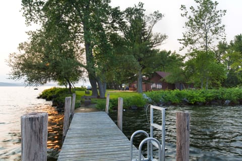 View of the house in summer, looking north from the front dock over Cayuga Lake