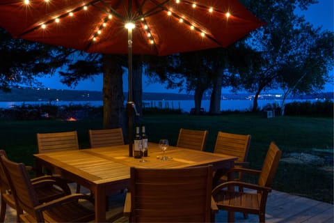 Outdoor dining table with panoramic Cayuga lake views
