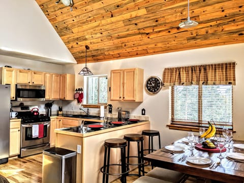 The kitchen has a gas stove and is equipped with everything you need to make a delicious meal for up to 12 guests and you have a relaxing view from the kitchen window. What more could you ask for?