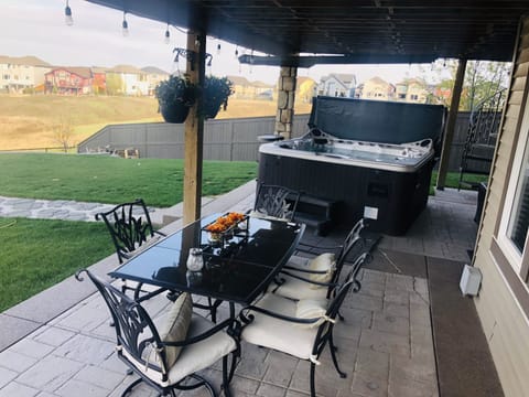 Your patio and hot tub. Protected from the rain. 
