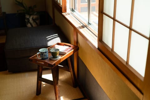 by the balcony in the Japanese room