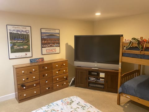 Large TV, toys, books and puzzles for kids.