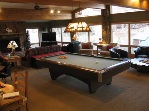 Open Concept Living Room with Multiple seating areas & GREAT Views of Mt. CB.