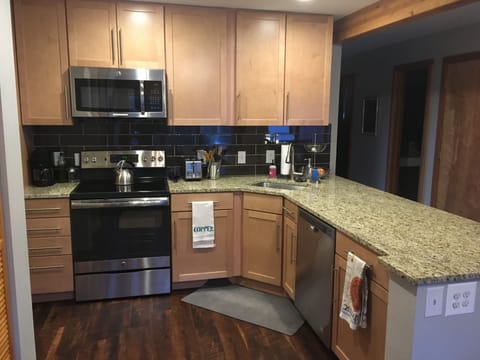 Rare unit with the stove moved off the bar. Yay for counter space!