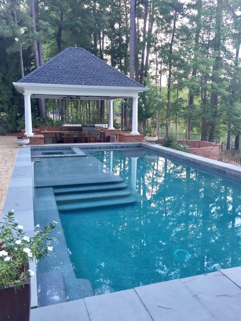Back pool with outdoor kitchen