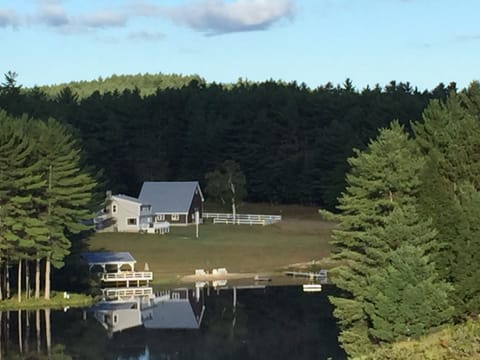 Mountain View Farm Guest House with reflection on pond
