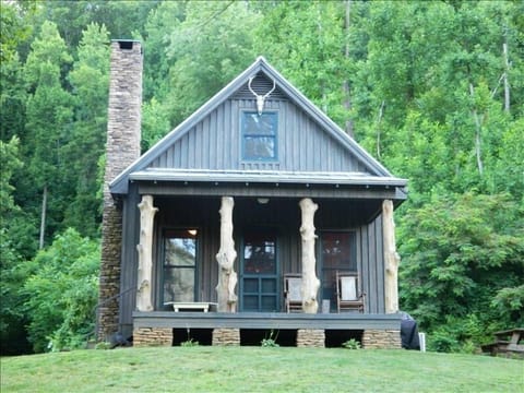 front of cabin in the summertime
