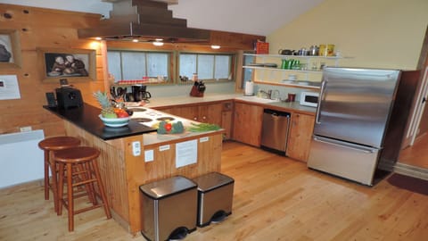 View of the kitchen from living room area.