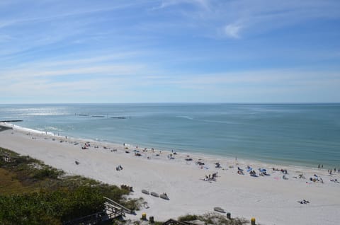 On the beach, sun loungers, beach towels