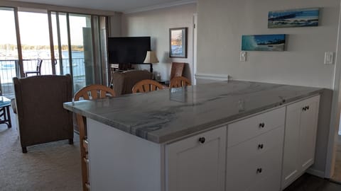 Kitchen peninsula looks out on the bay