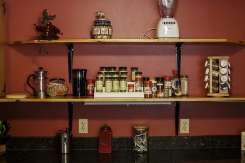 Fully stocked kitchen for all your cooking needs.Olive oil, spices, coffee, more