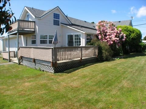 Backyard -  Completely Fenced with BBQ and Private Deck off of Kitcken!