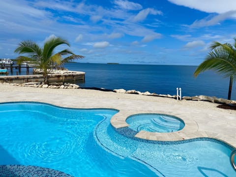 Enjoy our pool as you look at the beautiful Gulf waters. 