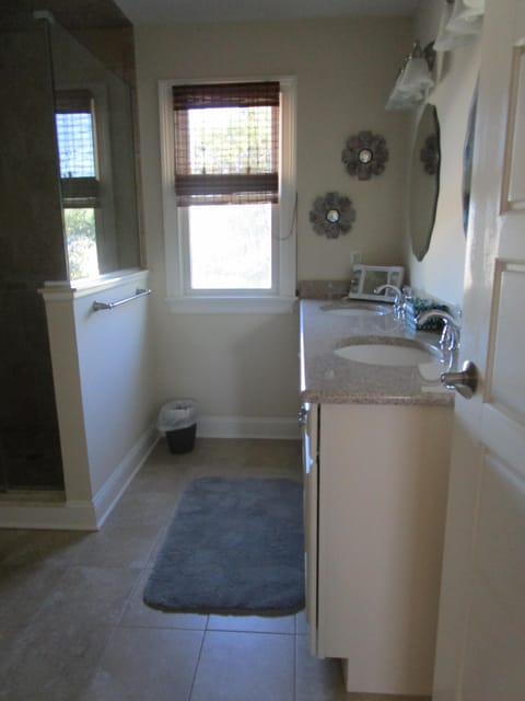 Combined shower/tub, hair dryer, towels, toilet paper