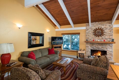 High Cathedral Ceilings With Plenty Of Natural Light.  Comfy entertainment area.