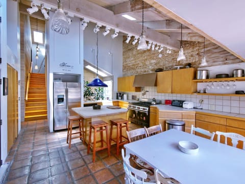 Kitchen. Stairs to Guest Suite (up 8 steps) and Master Bed (up 7 more steps)