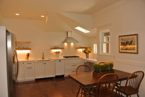 Kitchen and dining area with seating for four