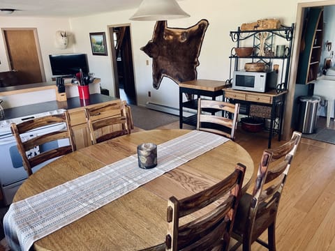 Kitchen - adding 2 table leaves seats up to 8-10, with seating for 3 at counter