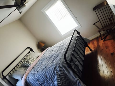 Maste  bedroom with queen sized bed. 