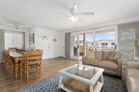 Bright and cheery open floor plan welcomes guests to this upper, ocean view unit. Ceiling fans throughout.