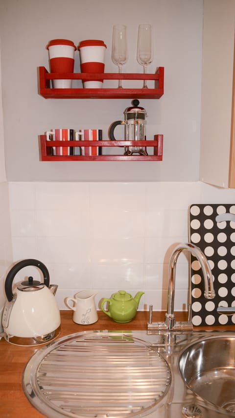 Fridge, microwave, coffee/tea maker, electric kettle