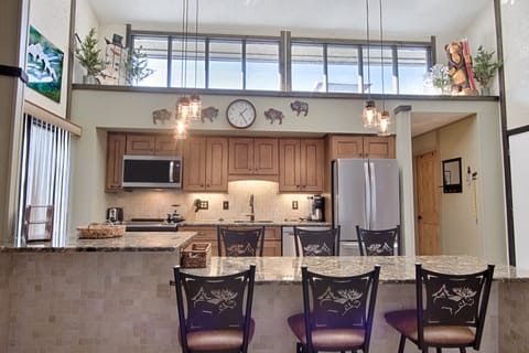 Udated & stocked kitchen. Sky lights provide a lot of natural light.