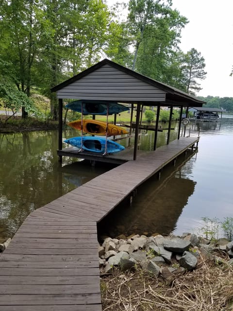 Full boathouse with lift and kayaks available for guest use