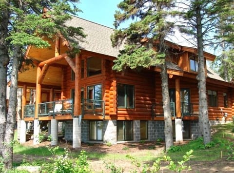 Lake front with large deck and tons of windows!