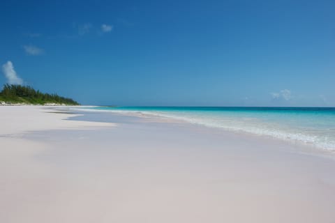 On the beach, sun loungers, beach towels