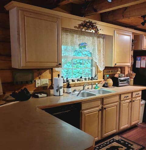 Kitchen with new Bosch dishwasher , laundry room next door with washer and dryer