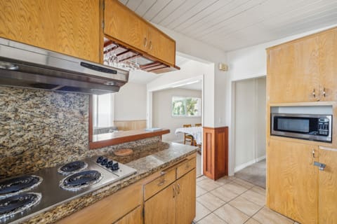 View from kitchen into living area and dining room