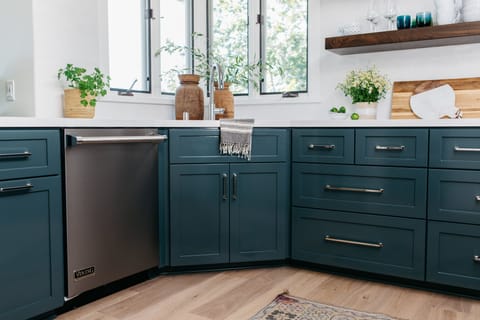 Updated kitchen with new countertops, cabinets and stainless steel dishwasher