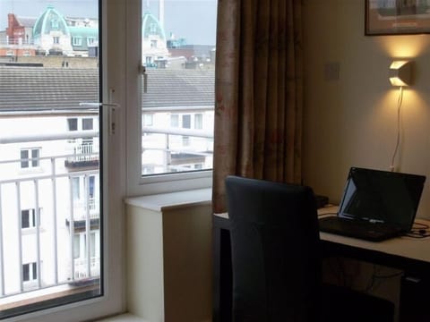 Living Room Work Desk and Balcony Access