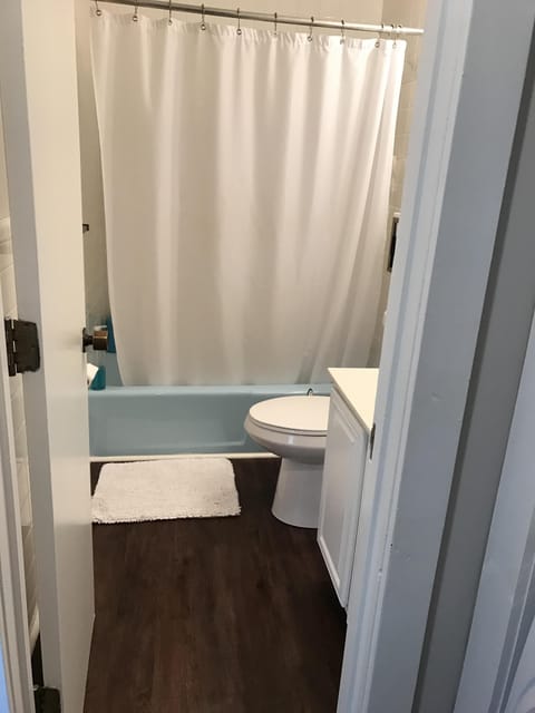 Combined shower/tub, hair dryer, towels, soap