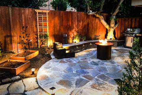 Heavenly private patio with grill, firepit, and a soothing water fountain.