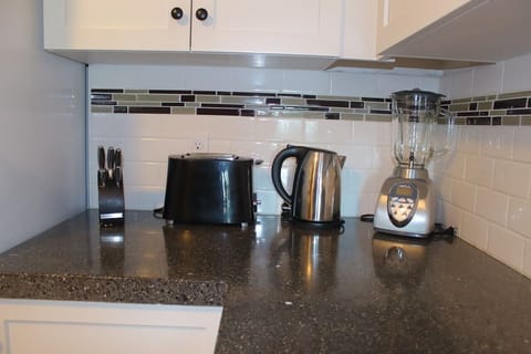 Fridge, microwave, dishwasher, coffee/tea maker