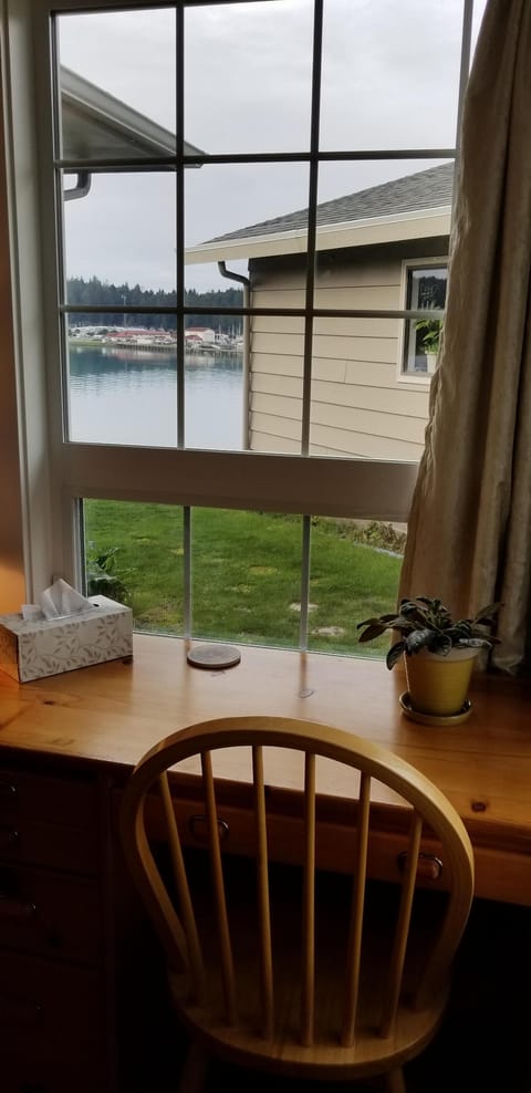 Desk in living area with view of Bay