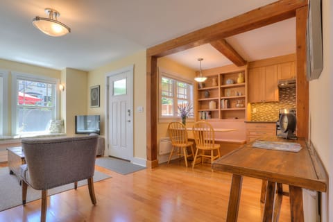 Open floor plan connects living, dining and kitchen areas. 