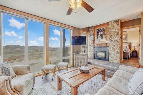 Family room with comfortable furniture and a queen sleeper sofa & AMAZING views!