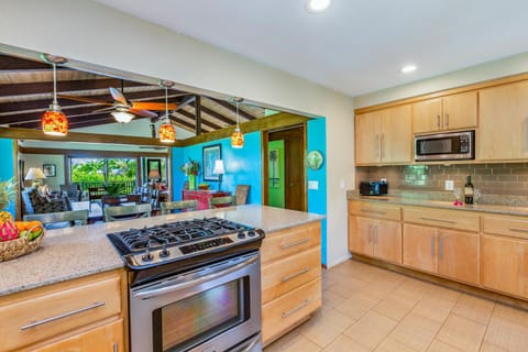 Enjoy cooking together with stainless steel appliances and bar seating that invites conversation.