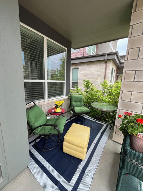 Front porch nook is perfect for a morning coffee or golden hour happy hour