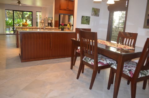 Dining room comfortably seats six. Dining set is solid mahogany