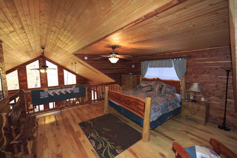 The loft bedroom offers a handmade, king-size bed.