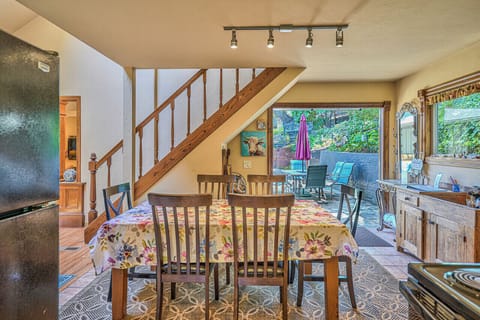 Kitchen eating area with stairs that lead to the "bonus loft" with king bed.