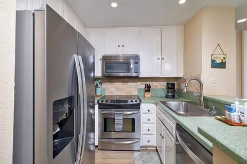 Stocked kitchen, warming drawer on bottom of oven. New dishwasher & frig. 2024