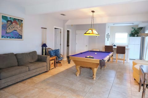Pool table, wet bar and pull out couch