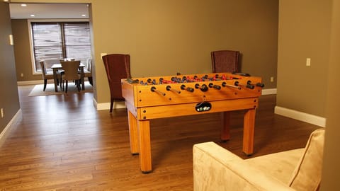 Entryway with foosball table and sleeper sofa