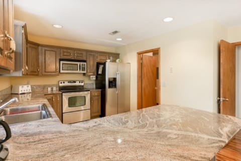 Open Kitchen with Granite Countertops and Stainless Appliances